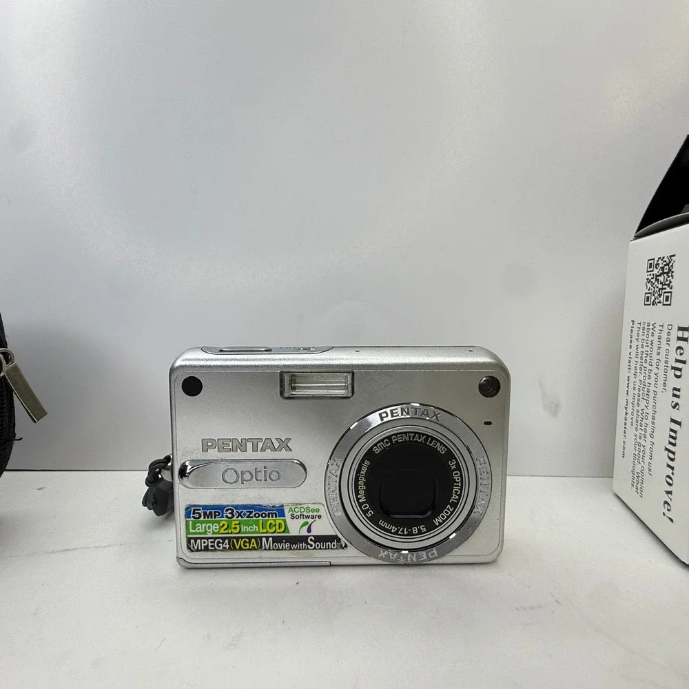 Pentax Optio S5z Silver Digital Camera 5.0MP 3x Zoom Bundle with Charger‎ Case